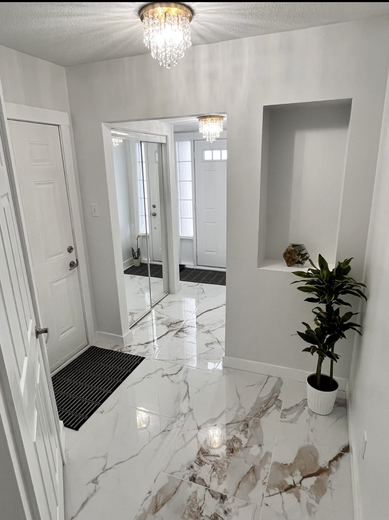 Kanata home entryway after painting — bright white walls