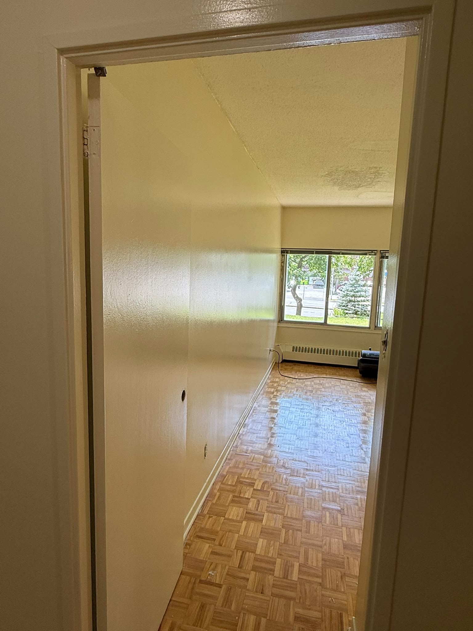 Apartment room after painting — clean white walls