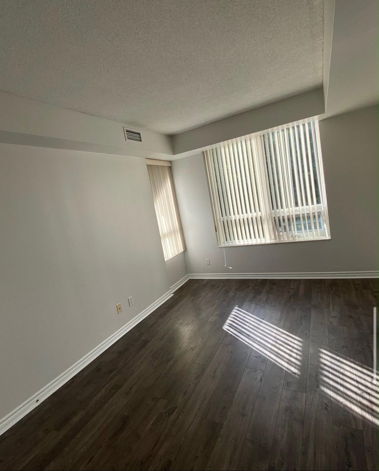Ottawa condo bedroom after painting — clean neutral walls with professional paint finish
